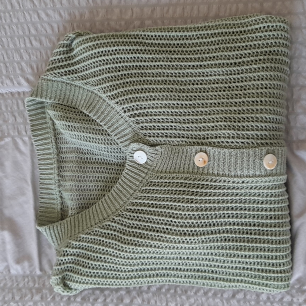 Un saco verde tejido
